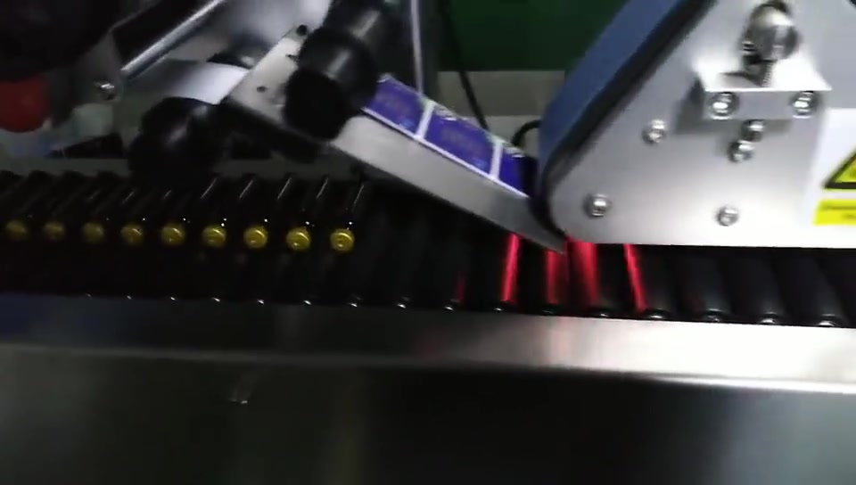 Màquina aplicadora automàtica d'etiquetes adhesives horitzontals per a vial
