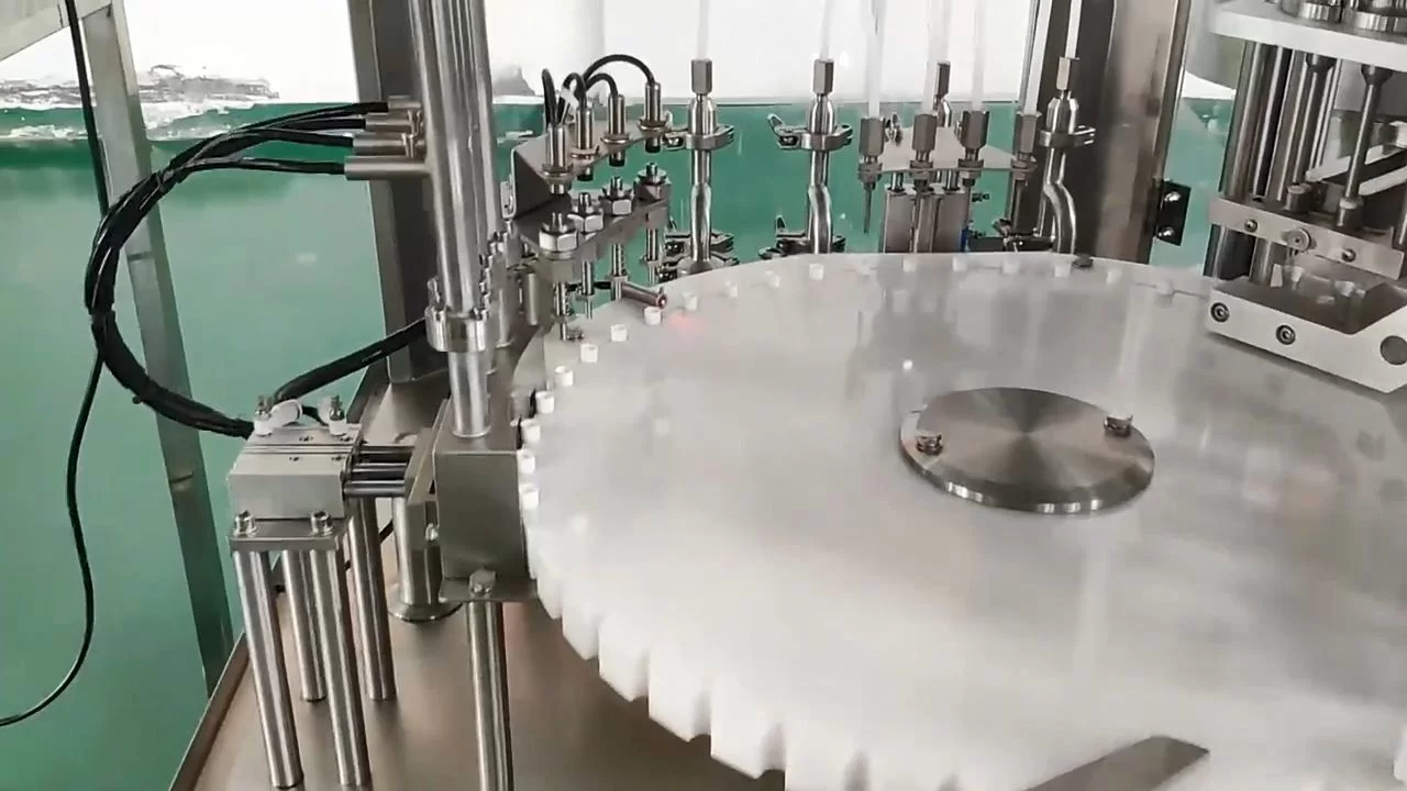 Automatisk parfumehætteglas stempelpumpefyldningspakkemaskine