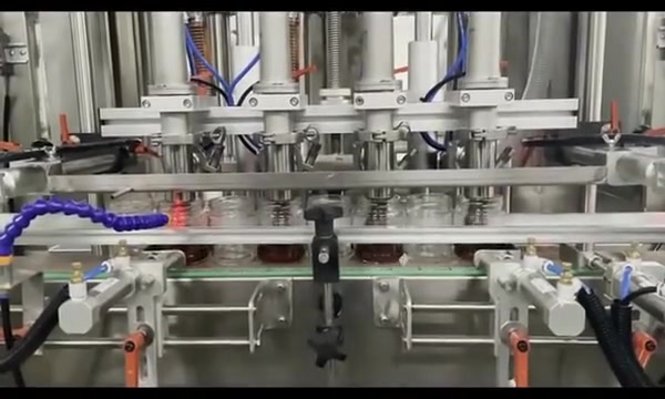 Automaattinen männän paksu pasta kastikepullon purkkien täyttökone