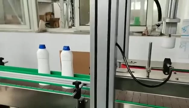 Máquina automática de tampar frascos de xampu