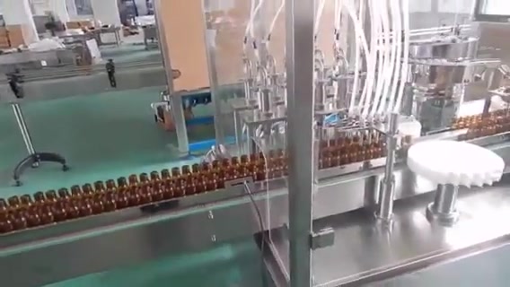 Tappatrice di riempimento liquido per olio essenziale di bottiglie automatizzata personalizzata