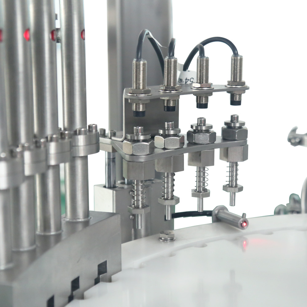 Automatic Perfume Vial Piston Pump Filling Packaging Machine Automatic Perfume Vial Piston Pump Filling Packaging Machine